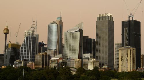 Sydney's skyline was partially obscured by dust this morning.