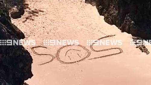 A message was scrawled in the sand.  (9NEWS)