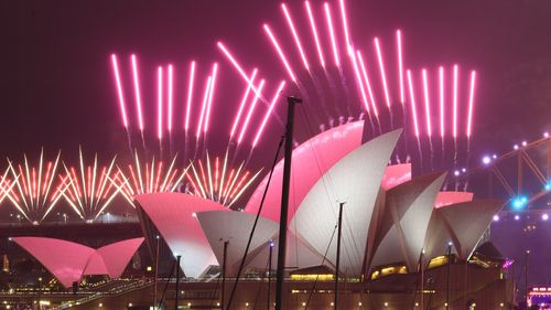 SYDNEY, AUSTRALIA - JANUARY 01: A fireworks display over the Sydney Opera House during New Year's Eve celebrations on January 01, 2021 in Sydney, Australia. Celebrations look different this year as COVID-19 restrictions remain in place due to the ongoing coronavirus pandemic. (Photo by Wendell Teodoro/Getty Images)