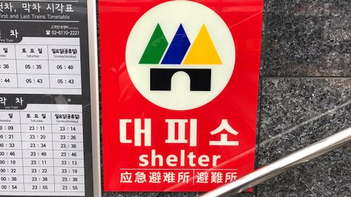 A shelter sign in the Seoul Subway. (Tom Steinfort)