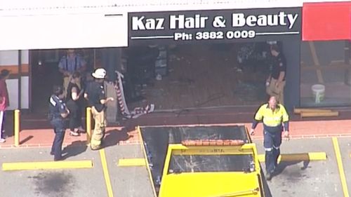 A car crashed into a shop at Bray Park, north of Brisbane. (9NEWS)