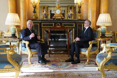 King Charles III speaks with Prime Minister of Australia, Anthony Albanese, as he receives realm prime ministers in the 1844 Room at Buckingham Palace on September 17, 2022 in London, England. 
