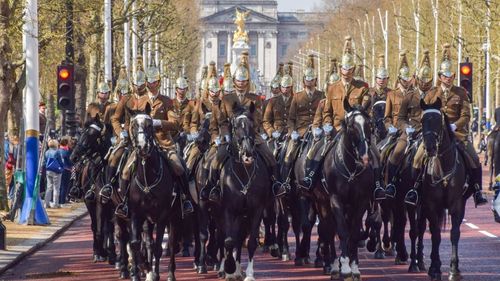 The Household Cavalry Mounted Regiment begins coronation rehearsals at Buckingham Palace and The Mall.