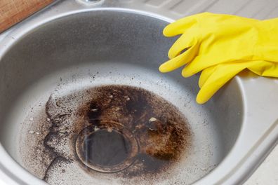 Dirty Sink at kitchen room. Clean a sink drain. unclog a kitchen sink without a disposal