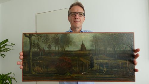 Arthur Brand with the returned van Gogh artwork.
