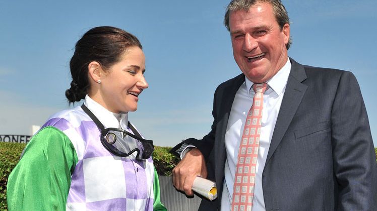 Michelle Payne poses with trainer Darren Weir after the win of Prince of Penzance.  (Getty)