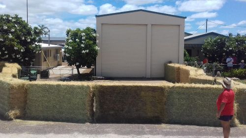 Hay bales were also used to create the makeshift enclosure. (Queensland Police)