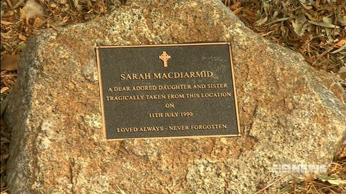A memorial sits at the carpark where Ms MacDiarmid was last seen. (9NEWS)