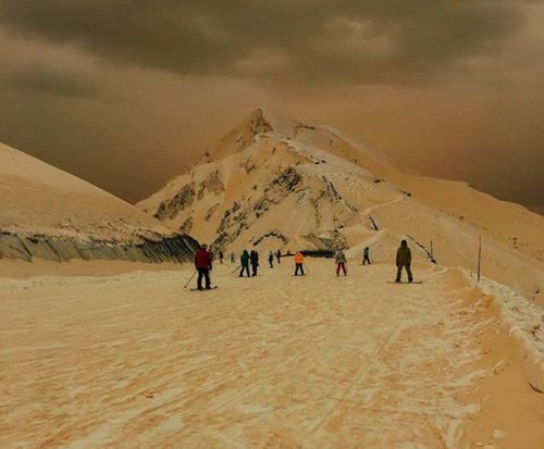 Photos taken at Russia's Sochi resort, which was host to the 2014 Winter Olympic Games, shows unfazed skiers taking to slopes covered in the unusual drift. (Instagram/sochi_)