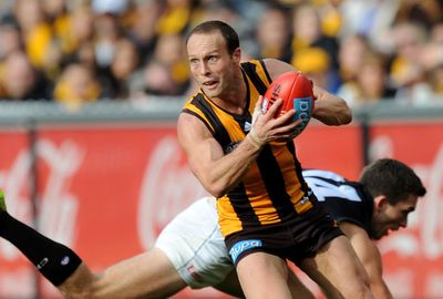 Brad Sewell (Hawks). 200 games. 32 goals. Two premierships ('08, '13).