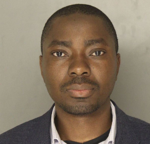 Uber driver and associate professor Richard Lomotey has been charged with kidnapping and imprisonment after allegedly locking two customers in his car.