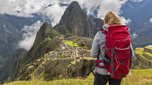 Woman backpacking alone travel