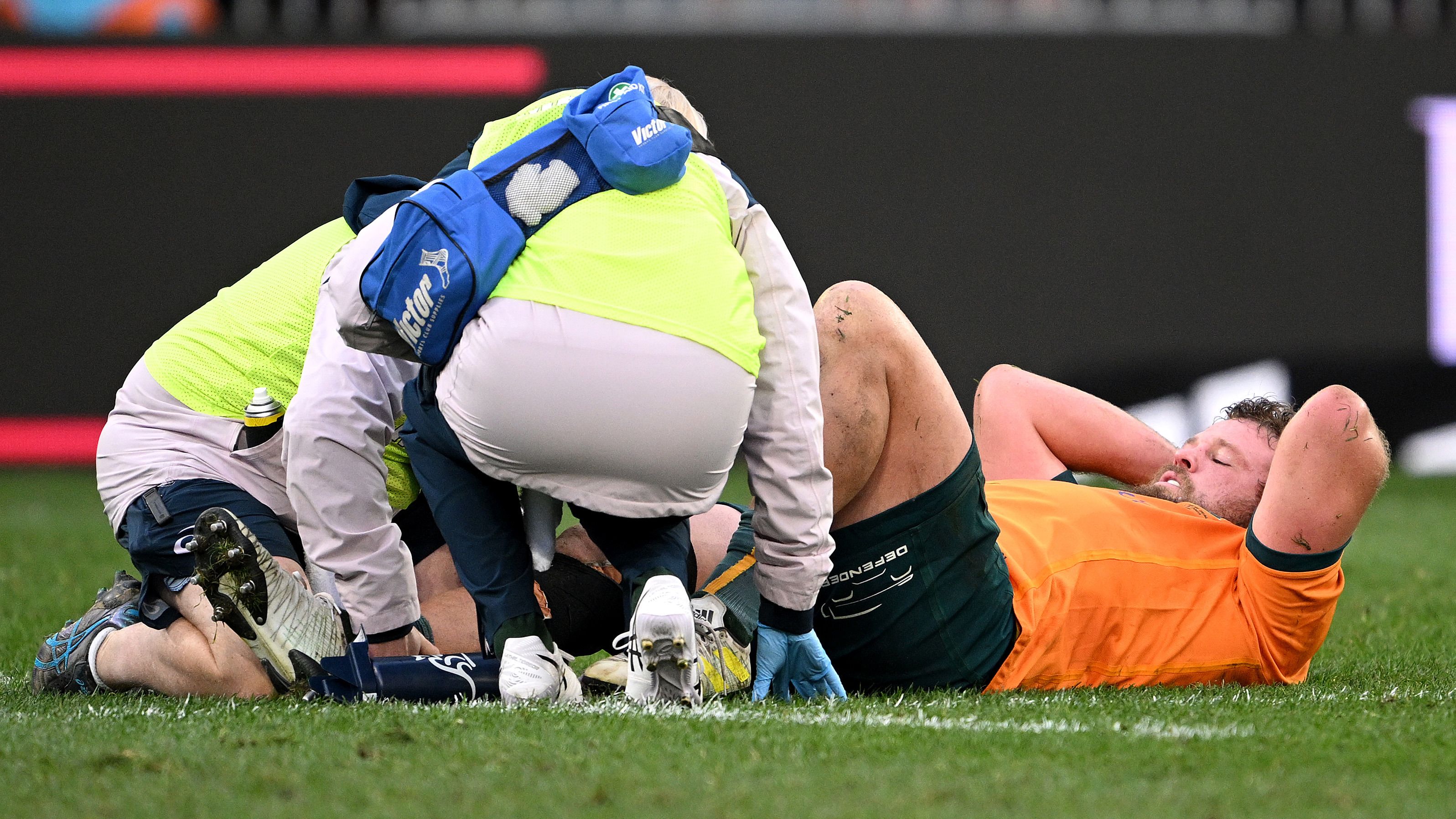 James Slipper of Australia receives medical attention at Forsyth Barr Stadium.