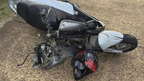 Police have released images of items left behind which include a silver SYM brand scooter, a red and black helmet and a silver metal chain necklace.