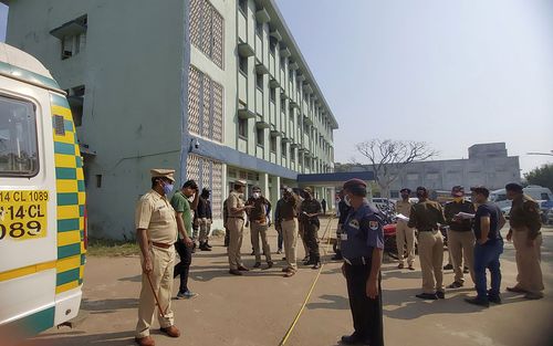 Police officers investigate the scene after a fire broke out at District General Hospital in Bhandara, about 70 kilometres from Nagpur, India, Saturday, Jan. 9, 2021.