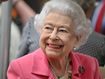 Queen driven around famous flower show in buggy