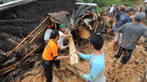 Authorities struggled to bring tractors and other heavy equipment over washed-out roads after torrential rains sent mud and rocks crashing on to the hilly hamlets.