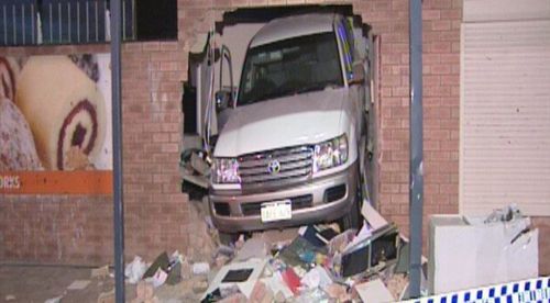 Four-wheel-drive stuck in Perth shopping centre wall after ram-raid 