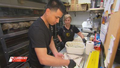 International students working at fast food restaurant in Sydney.