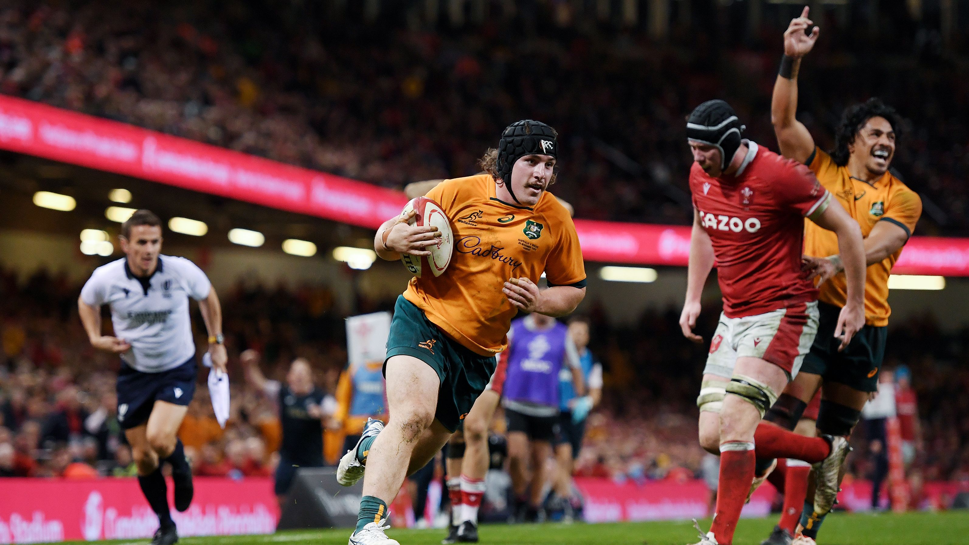 Lachlan Lonergan of Australia goes over to score.