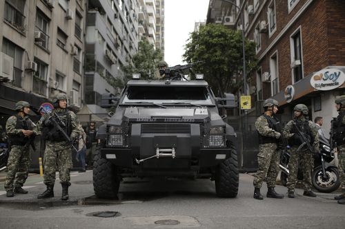 Border police officers block a street in the city ahead of the G20.