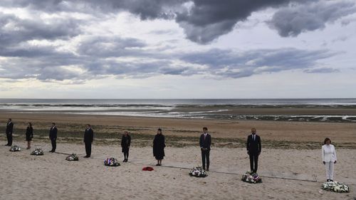 U.S House Speaker Nancy Pelosi, French Prime Minister Edouard Philippe, Canadian Prime Minister Justin Trudeau, Britain's Defence Secretary Penny Mordaunt and Dutch Defence Minister Ank Bijleveld an other officials attend an international ceremony on Juno Beach in Courseulles-sur-Mer, Normandy.