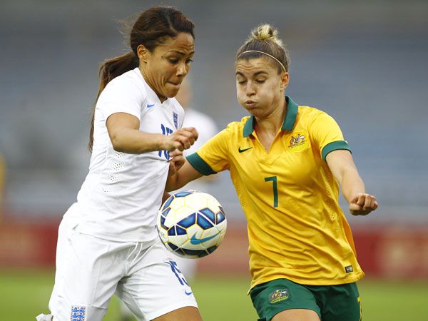 Australia's Stephanie Catley challenges England's Alex Scott for the ball. (Getty)