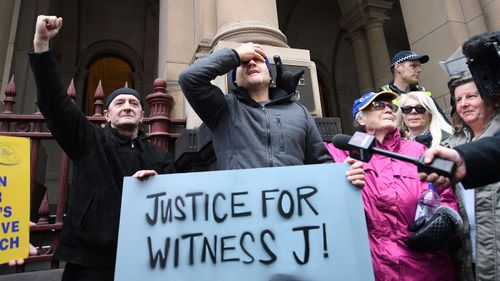 Supporters of abuse victims are seen outside the Supreme Court of Victoria as Cardinal George Pell appealed his conviction.