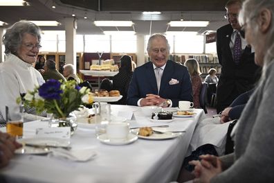 King Charles III meets volunteers and service users of the charity organisation Age UK, during an afternoon tea at the Colchester Library, in Colchester, England, Tuesday March 7, 2023 