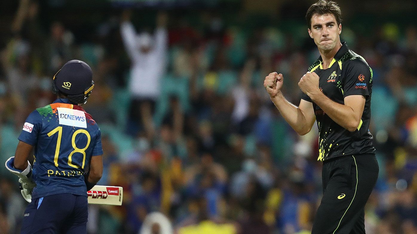 Pat Cummins of Australia celebrates taking the wicket of safduring game one in the T20 International series between Australia and Sri Lanka