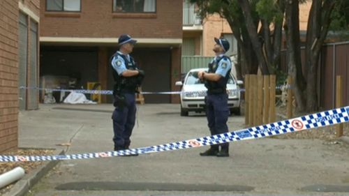 Woman charged with reckless wounding after man dies in Sydney apartment, second woman in hospital