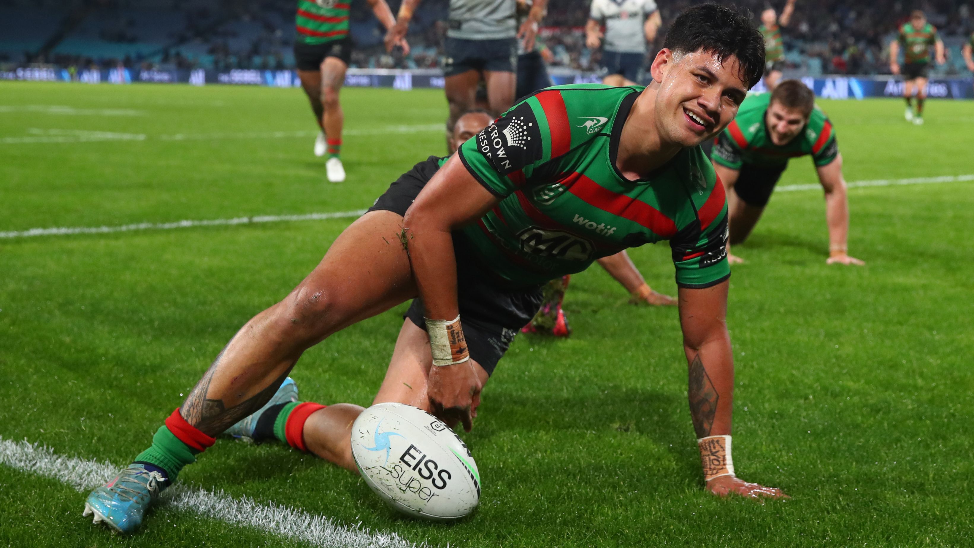 Jaxson Paulo of the Rabbitohs celebrates scoring a try during the round 19 NRL match between the South Sydney Rabbitohs and the Melbourne Storm at Stadium Australia on July 23, 2022 in Sydney, Australia. (Photo by Jason McCawley/Getty Images)
