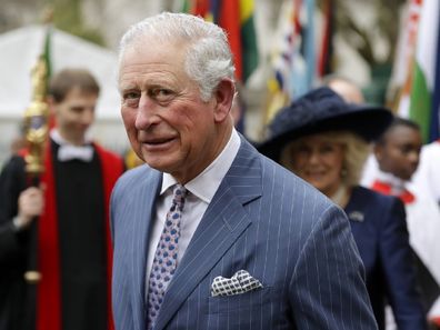 Prince Charles and Camilla the Duchess of Cornwall, in the background, leave after attending the annual Commonwealth Day service at Westminster Abbey in London.