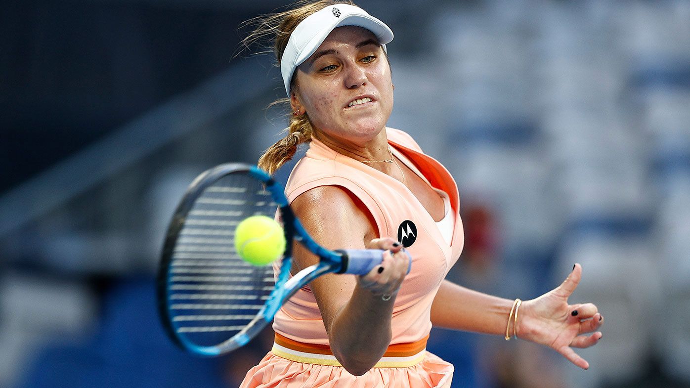 Sofia Kenin of United States plays a forehand in her first round singles match against Madison Keys
