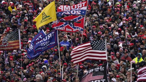 Trump supporters listening to a speech from the president calling on them to march on Congress.