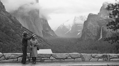 Park superintendent Bob Binnewies points out highlights from Inspiration Point to Queen Elizabeth II