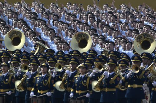 BEIJING, CHINA - SEPTEMBER 03: A military band and choir perform before the military parade marking the 80th anniversary of victory over Japan and the end of World War II, in Tiananmen Square on September 03, 2025, in Beijing, China. China's Victory Day military parade serves as a powerful display of national pride and military power. This year's parade carries heightened geopolitical weight with the attendance of leaders like Vladimir Putin, Kim Jong Un and Narendra Modi, underlining China's di