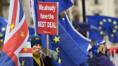Pro EU protesters demonstrate outside of the parliament calling for a People's Vote in London.