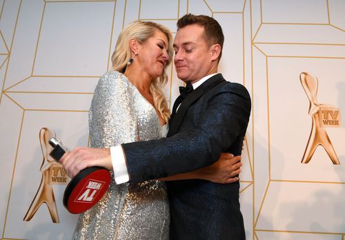 Denyer is hugged by wife Cheryl after accepting his Gold Logie. Picture: AAP