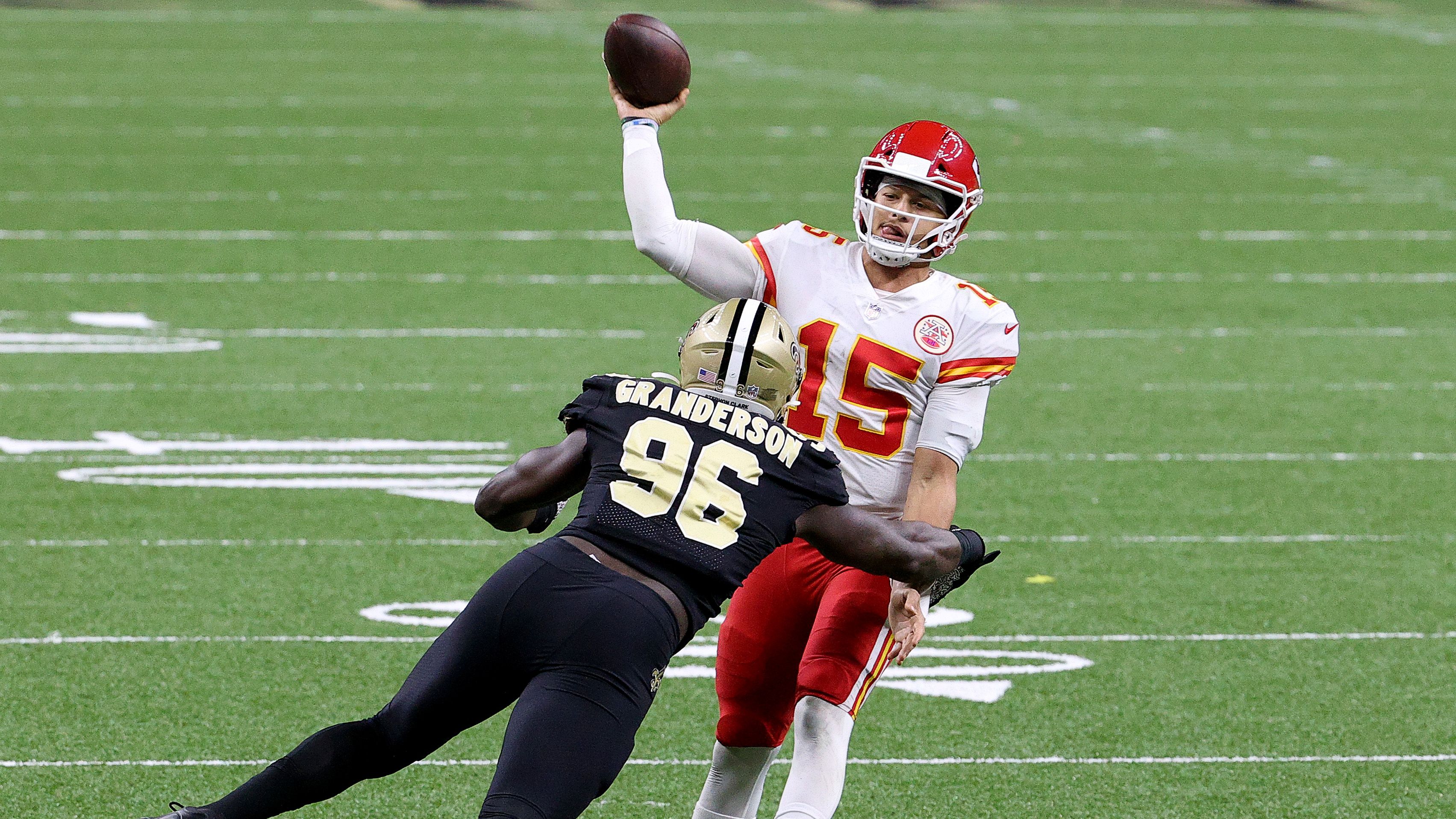 Patrick Mahomes of the Kansas City Chiefs throws under pressure by Carl Granderson of the New Orleans Saints.