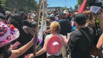 Victoria Police said they were &quot;confronted&quot; by &quot;up to 50&quot; protesters soon after the march started.﻿