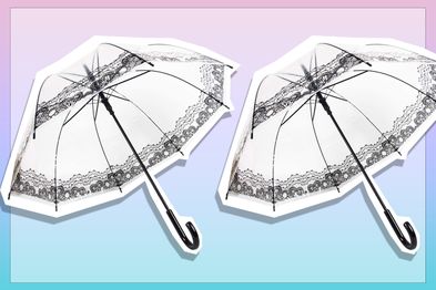 9PR: Large clear umbrella with black lace detailing.
