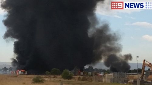 Explosions can be heard from the site. (9NEWS)