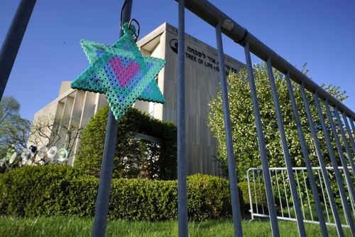 A Star of David hangs from a fence outside the dormant landmark Tree of Life synagogue in Pittsburgh's Squirrel Hill neighbourhood, Apr. 19, 2023. 