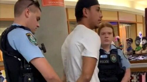 The 27-year-old man was arrested after allegedly attacking a security guard at the Merrylands Woolworths store.
