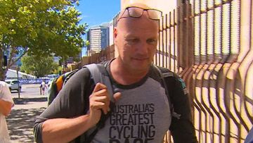 Dutch photographer fined over Tour Down Under crash that injured police officer