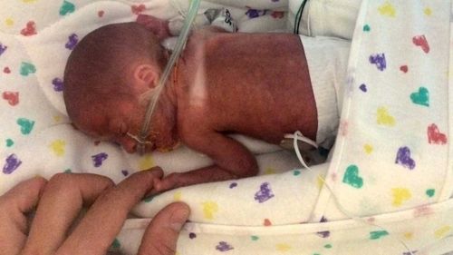 Defiant mother saves premature baby born on cruise ship