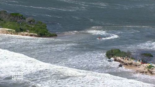 Bribie Island king tide split Queensland