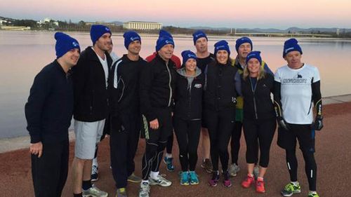 Abbott braves chilly Canberra on run in fight to freeze motor neurone disease