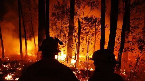 CFA crews monitor bushfires and begin back burns between the towns of Orbost and Lakes Entrance in east Gipplsland  on January 02, 2020 in Australia. 